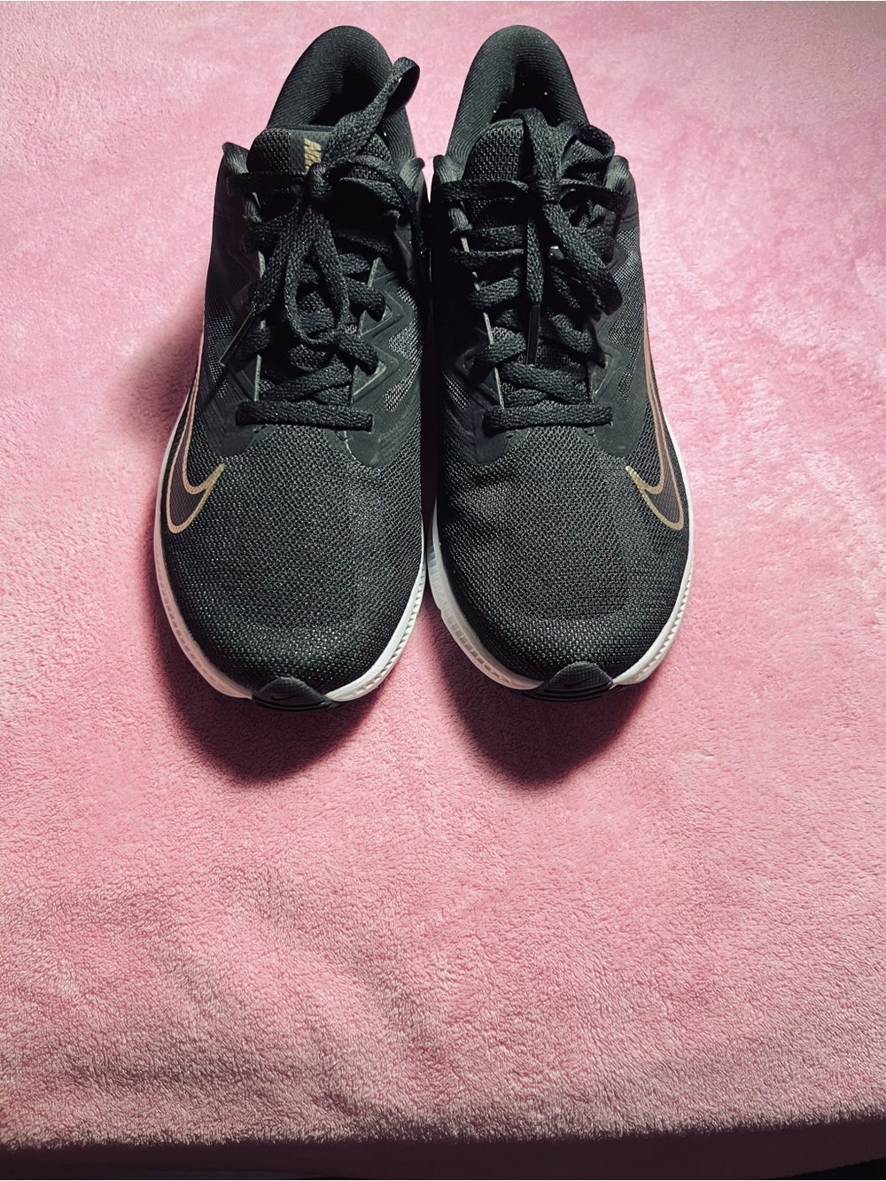 Nike Women's Black Running Shoes with Gold Swoosh